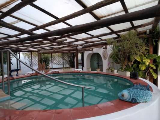 The indoor warm pool, filled with natural hot springs water