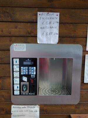 At this filtered water dispenser on the side of the road, you can bring your own bottle and pay 5 cents for regular filtered water or 10 cents for sparkling water