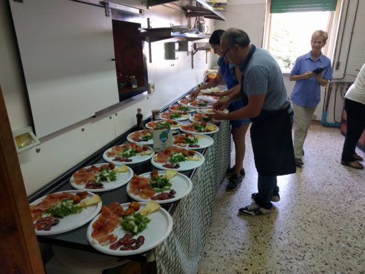 Vincenzo preparing Jim's birthday lunch for 25 people