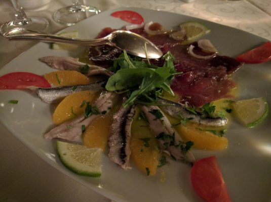 Our appetizer - marinated anchovies and tuna crudo