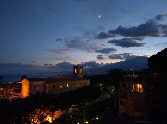 View of the church below and the coastal towns beyond