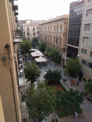 The car-free shopping street below