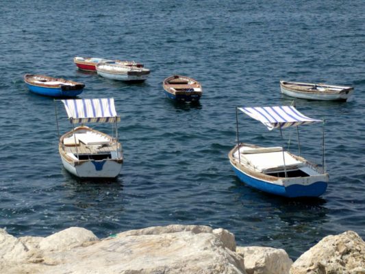 Little boats anchored in one of the harbors