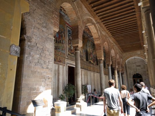 The entrance to the chapel is on the second level of the courtyard