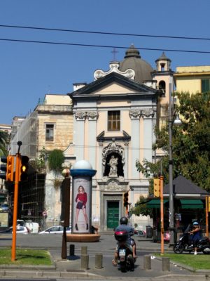 A neighborhood church with 21st century paraphernalia in front