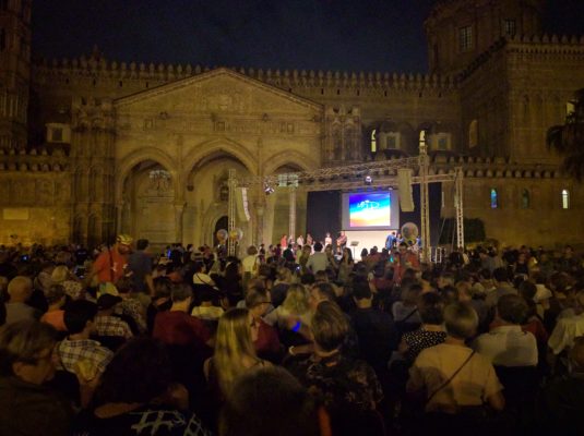 The stage and audience on the main plaza in front of the cathedral