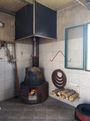 Cooking the sheep's milk in a giant kettle