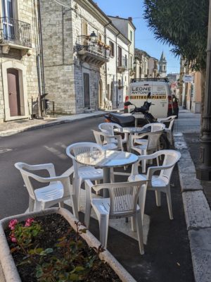 The bar has seating "al fresco" in a parking space across the street