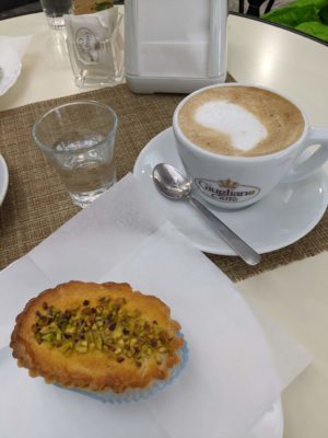 cappuccino and pistachio pastry