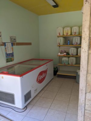 The grocery annex contains a freezer with frozen meat/seafood/veggies and shelves with bulk cleaning products - liquid soap, laundry detergent, household cleaners, etc where you can bring your own container and fill it from the bulk jug