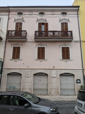 Note the Liberty-style balcony railings - there is a pharmacy on the ground floor which was closed for lunch when I took the photo, which is why the shutters are closed