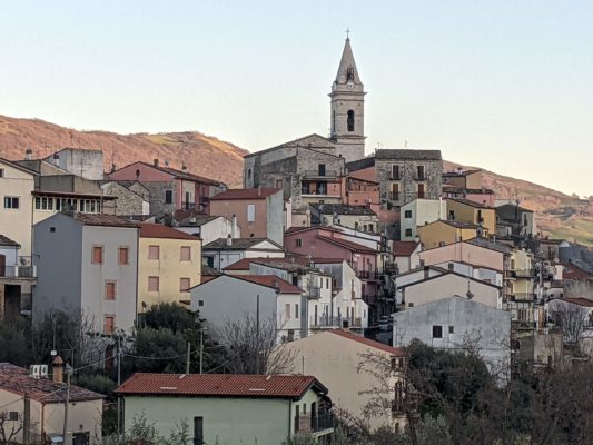 A view of the old town with the main church on top of the hill, the newer houses are spilling down the hill