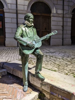 Here's a statue of a local singer-songwriter, composer, and producer - someone put a scarf on him because it was cold outside