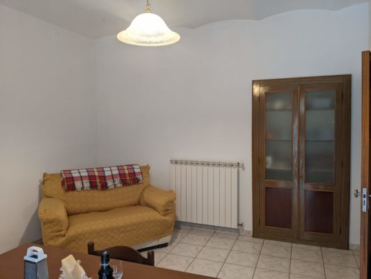 the seating area - the built-in cabinets house dishes and pots and pans