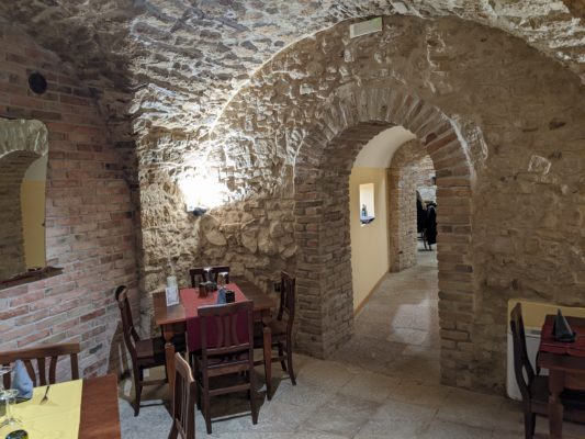 The dining area is down in the basement among the old building structure