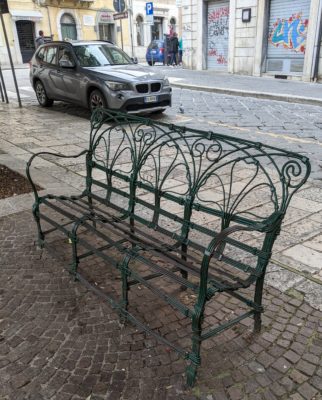 A park bench in the little park/plaza next to Piazza Pepe