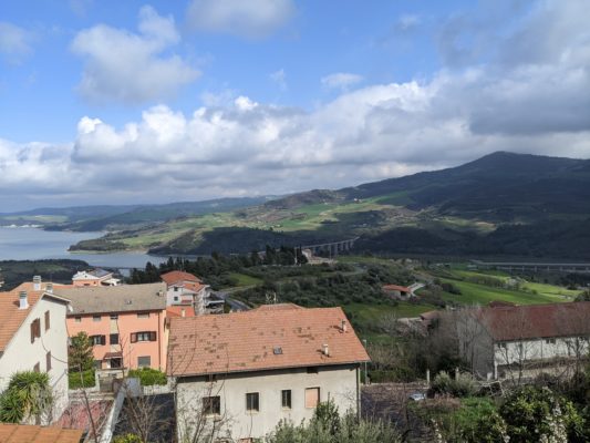 view of the valley and the lake with some Guardialfiera houses in the foreground