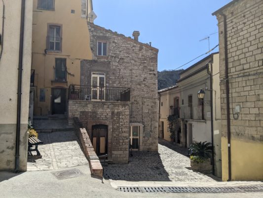 I like this little plaza at the edge of the oldest part of the village - from where I'm standing, steps go down to the plaza and behind me is an asphalt street where cars can drive