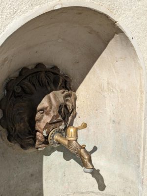 One of the spigots on a fountain at the town piazza