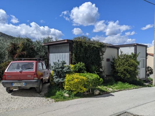 we pass by the funeral home on some of our daily walks which is really just a garage building for the hearse and an adjacent building for the mortician's office - funeral services are held at one of the churches