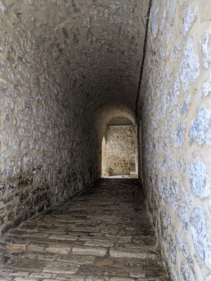 and here's an arched passage next to our house - I like the way the sun comes in to illuminate the entry at the other end - so inviting