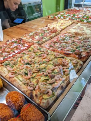 more pizza on display - notice that the closest one has shrimp on it