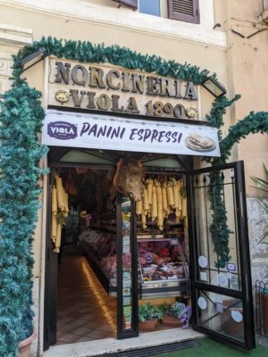 the entrance to the salumi shop - Norcineria means that it is in the style of the town of Norcia, Viola is the family name, and the shop has been around since 1890