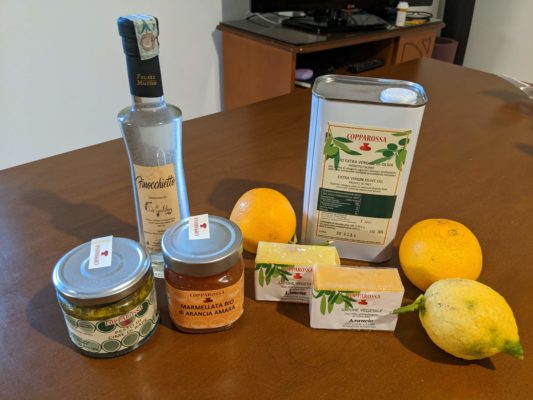 we bought some things from the little store - crema di ripe (cream from rapini greens), finochietto (fennel liqueur), sour orange marmalade, olive oil soaps, local olive oil in the can, and oranges and a lemon which were gifted to us