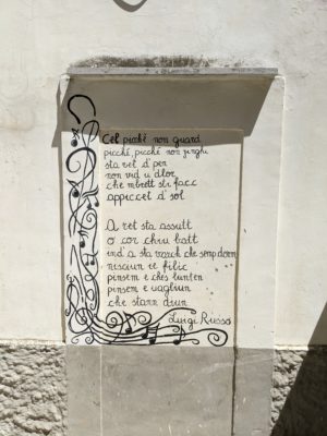 in addition to artwork painted on houses, we saw lots of poetry on the walls...