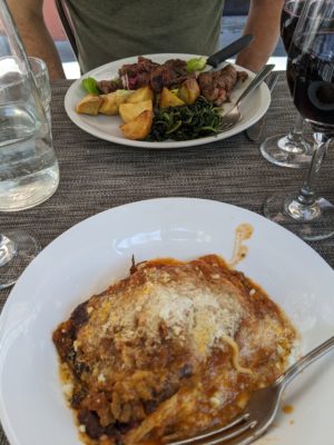 for entrees, I had Abruzzese lasagna and Chad had traditional steak with potatoes and chicory - also we had Abruzzese red wine