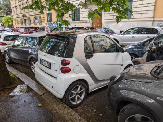 One benefit of a Smart car is that it can park perpendicular in a parallel parking zone.